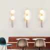 modern yellow travertine glass globe wall sconce 3