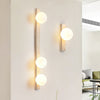 modern yellow travertine glass globe wall sconce 3
