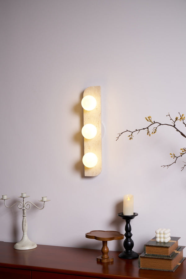 modern yellow travertine glass globe wall sconce