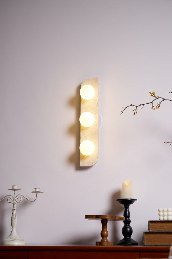 modern yellow travertine glass globe wall sconce
