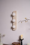 modern yellow travertine glass globe wall sconce