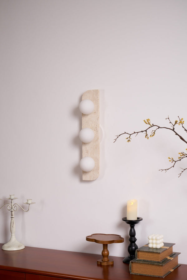 modern yellow travertine glass globe wall sconce