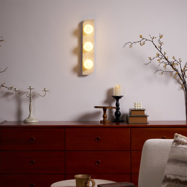 modern yellow travertine glass globe wall sconce