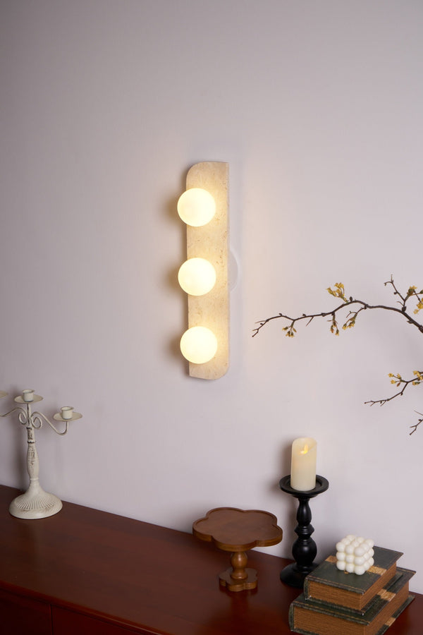 modern yellow travertine glass globe wall sconce