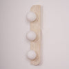 modern yellow travertine glass globe wall sconce