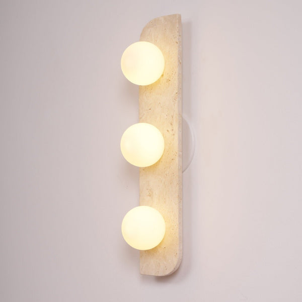 modern yellow travertine glass globe wall sconce