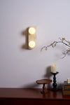 modern yellow travertine glass globe wall sconce