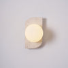 modern yellow travertine glass globe wall sconce