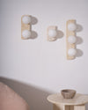 modern yellow travertine glass globe wall sconce