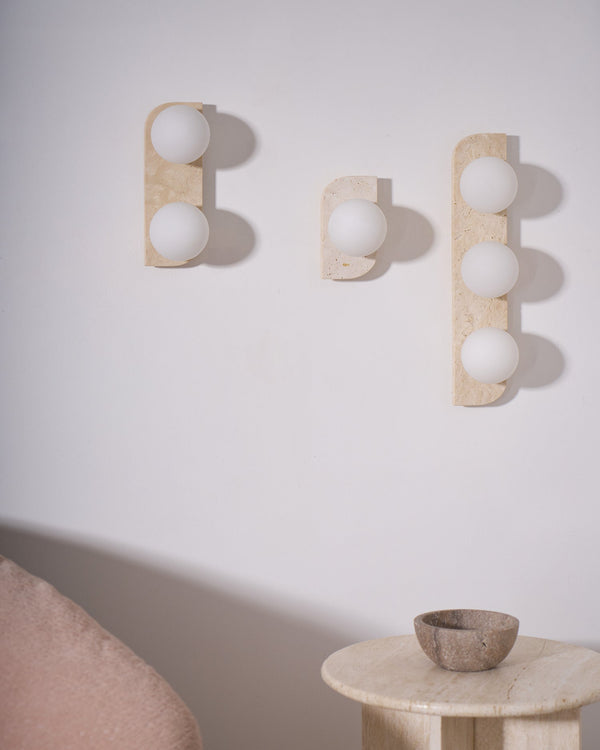 modern yellow travertine glass globe wall sconce