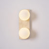 modern yellow travertine glass globe wall sconce