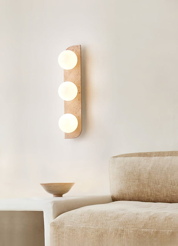 modern yellow travertine glass globe wall sconce