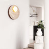 modern yellow travertine glass orb wall sconce