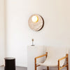 modern yellow travertine glass orb wall sconce