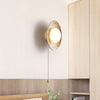 modern yellow travertine lunar eclipse wall sconce