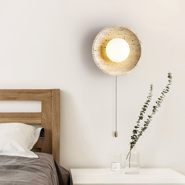 modern yellow travertine lunar eclipse wall sconce