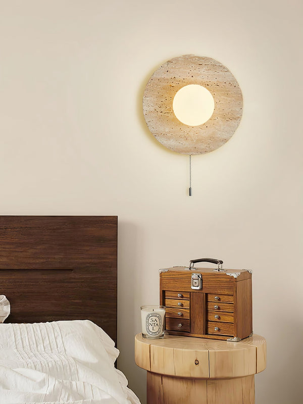 modern yellow travertine lunar eclipse wall sconce