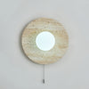 modern yellow travertine lunar eclipse wall sconce