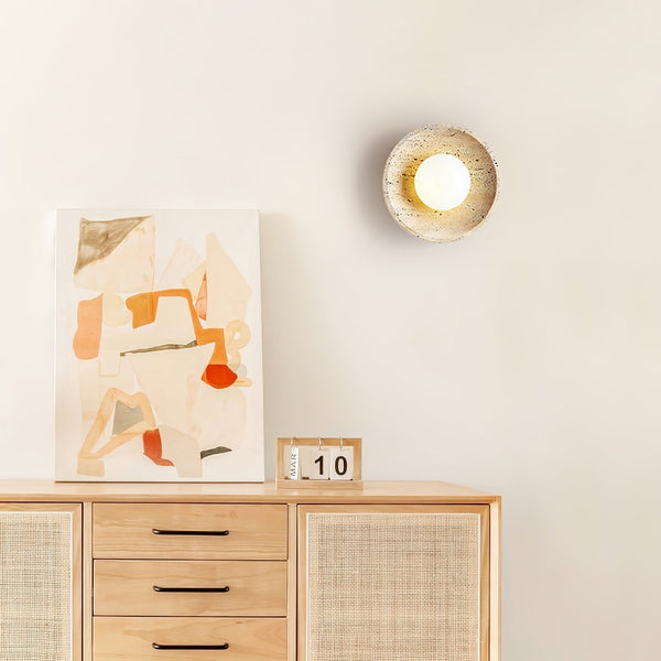 modern yellow travertine lunar eclipse wall sconce