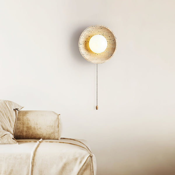 modern yellow travertine lunar eclipse wall sconce