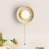 modern yellow travertine lunar eclipse wall sconce