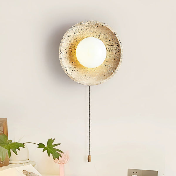 modern yellow travertine lunar eclipse wall sconce