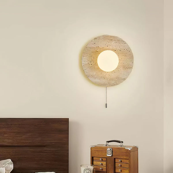 modern yellow travertine lunar eclipse wall sconce