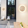 modern yellow travertine round led wall sconce