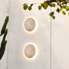 modern yellow travertine round led wall sconce