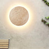 modern yellow travertine round led wall sconce