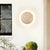 modern yellow travertine round led wall sconce