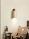 modern yellow travertine walnut capsule wall sconce