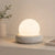 neutral travertine glass globe led table lamp