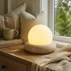 neutral travertine glass globe led table lamp