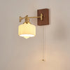 traditional walnut brass glass wall sconce