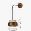 wabi sabi travertine cylinder wall sconce matte black