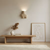 yellow travertine abstract wall sconce