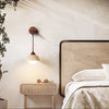 yellow travertine arched wall sconce walnut