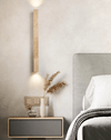 yellow travertine column wall sconce with dark walnut wood