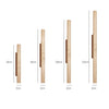 yellow travertine column wall sconce with dark walnut wood