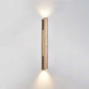 yellow travertine column wall sconce with dark walnut wood