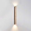 yellow travertine column wall sconce with dark walnut wood