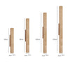 yellow travertine column wall sconce with dark walnut wood