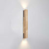 yellow travertine column wall sconce with dark walnut wood