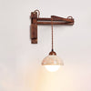 yellow travertine dome wall sconce walnut arm