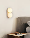 yellow travertine double globe wall sconce