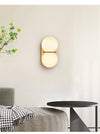 yellow travertine double globe wall sconce