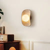 yellow travertine frosted glass globe wall sconce