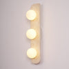 yellow travertine glass globe plug in wall sconce