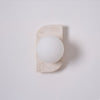 yellow travertine glass globe plug in wall sconce
